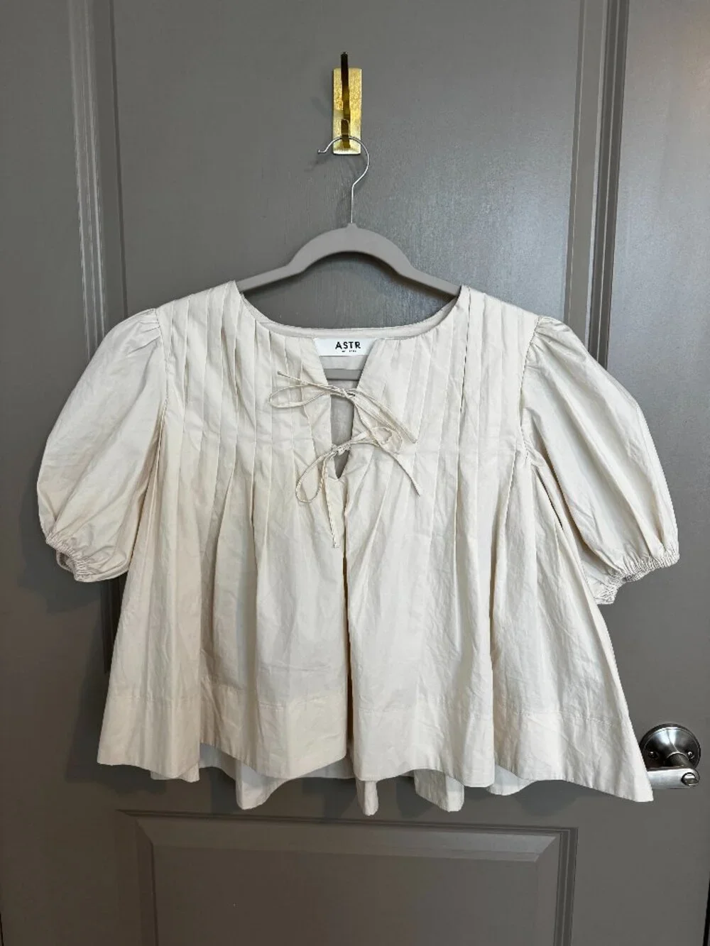 Astr cream blouse